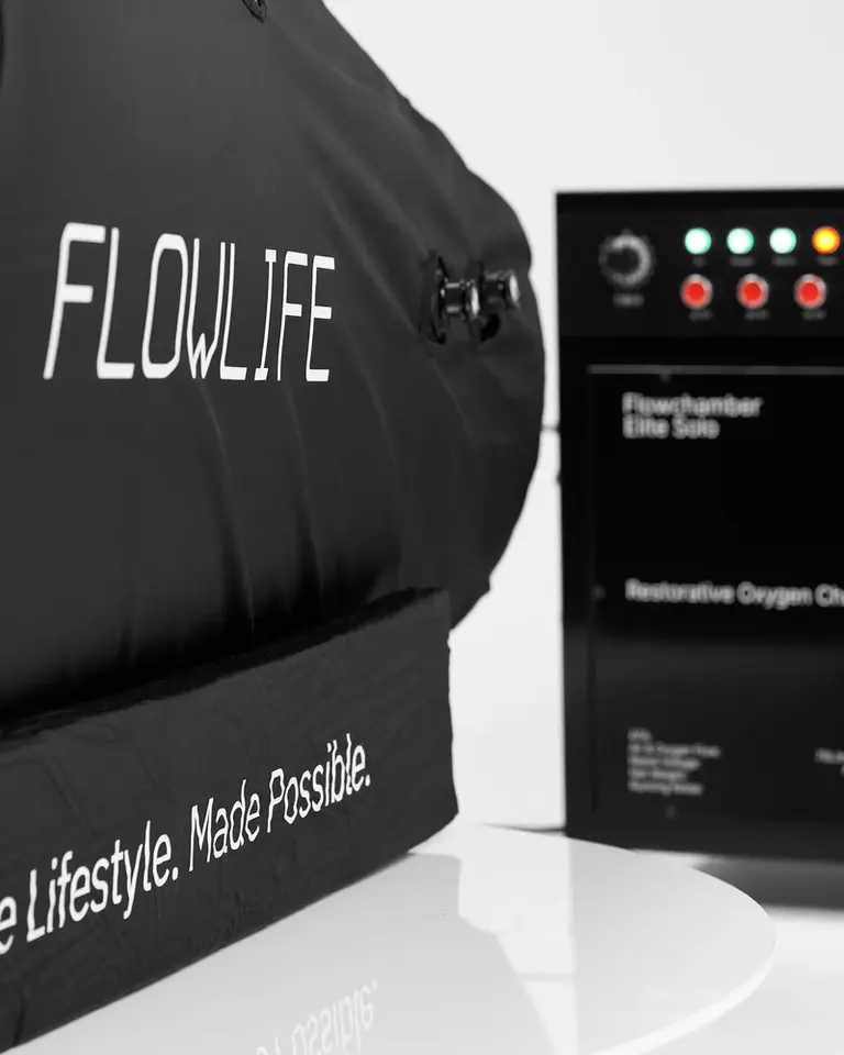 Black Flowchamber Oxygen Elite 170 Soft-Shell close-up showing the white logo and control system indicator lights.