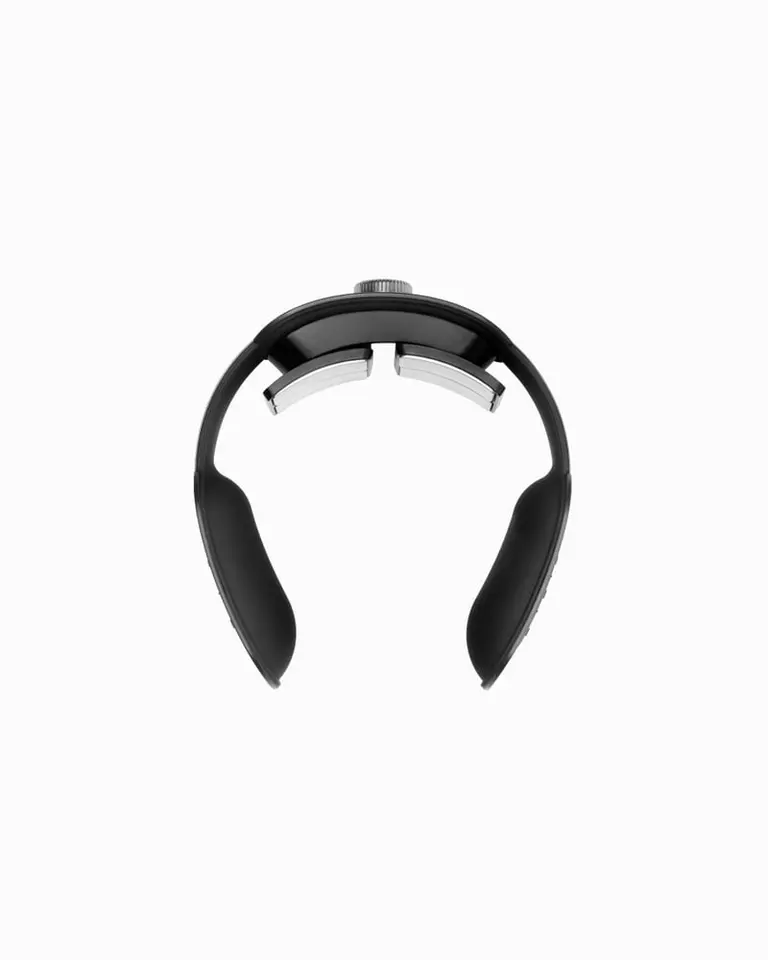 Flowtens Neck in a top-down view with black ergonomic casing, metallic electrode pads, and a silver rotating crown.