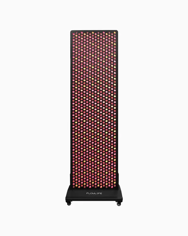 Flowlight 4300 Eight Waves red light therapy panel with illuminated LEDs and a wheeled stand for full-body recovery.