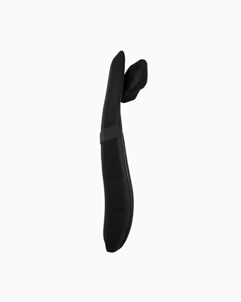 Side profile of the black Flowseat Pro, an ergonomic vibrating massage seat for muscle relaxation and recovery.