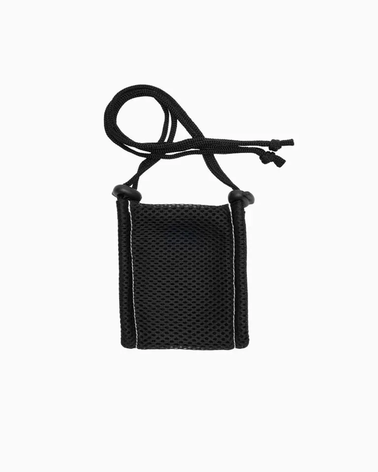 Black mesh storage pouch with a drawstring cord for the Flowroller Ball Go vibration massage ball.