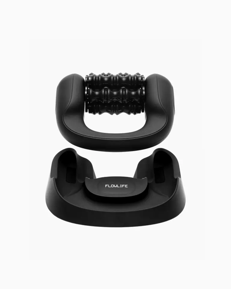 Black Flowlymph Roller Go shown with its dual-mode handheld attachment and floor stand for versatile lymphatic drainage.