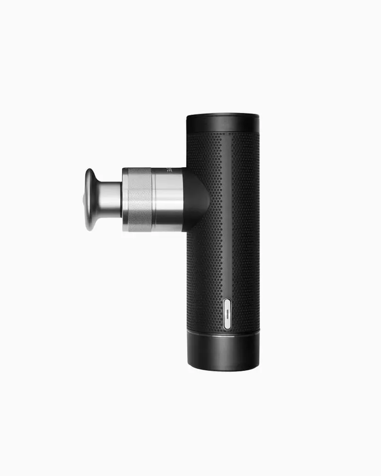 Flowgun ONE percussive therapy device with a textured black grip and silver aluminium body in a side profile.